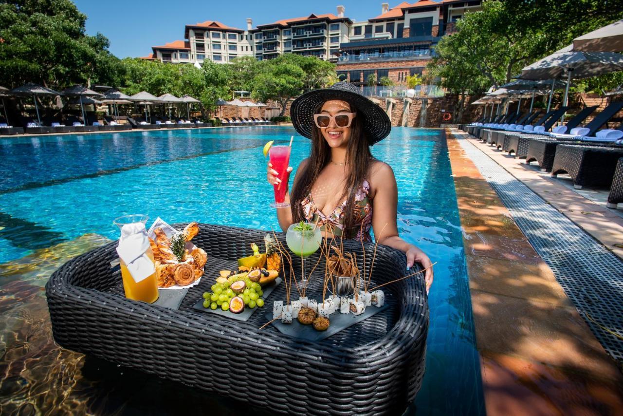 The Capital Zimbali Hotell Ballito Exteriör bild Poolside at the hotel